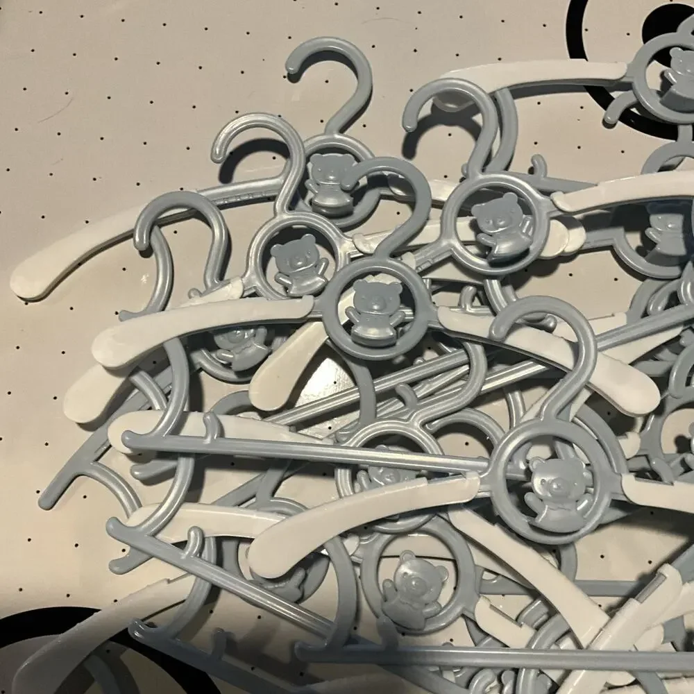 Lot of 19 Grey Extending Hangers for Children Clothes Bear
